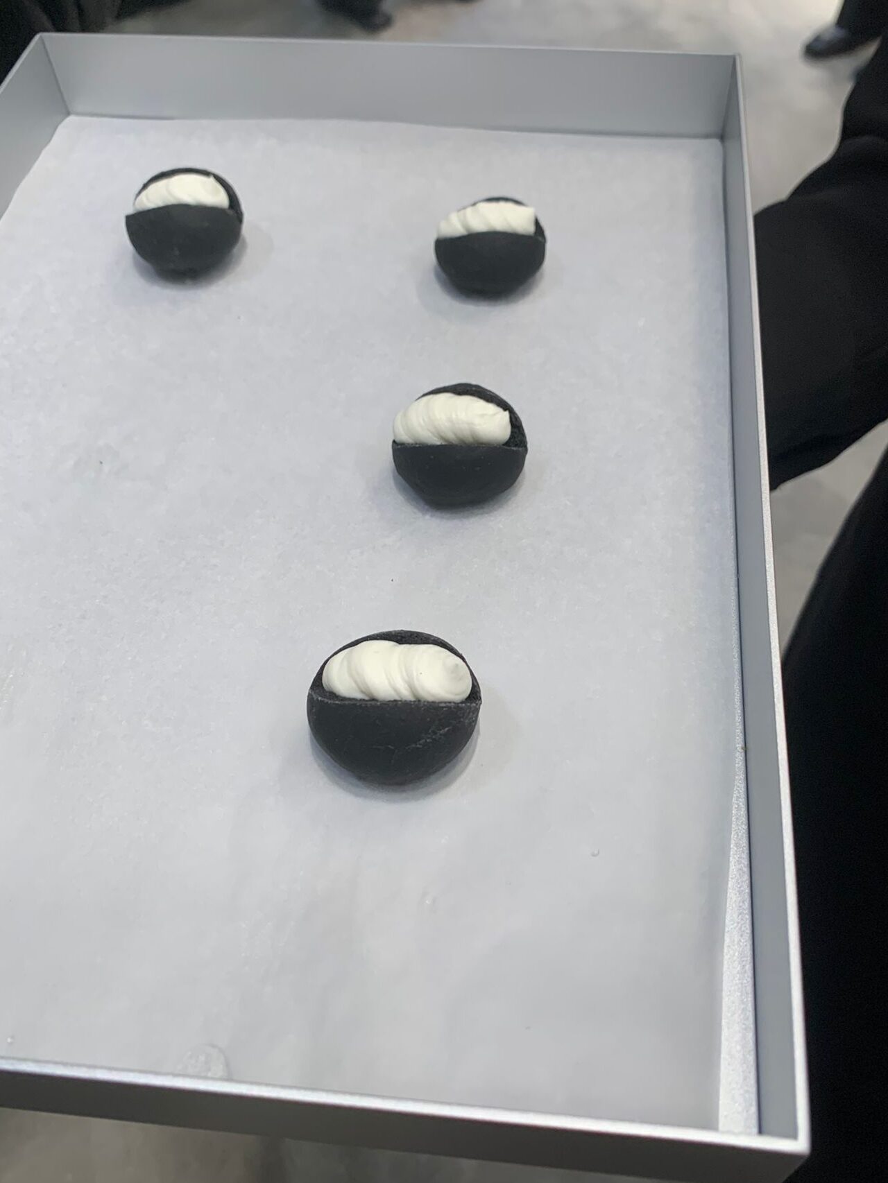 Dark, abstract canapés at Balenciaga store